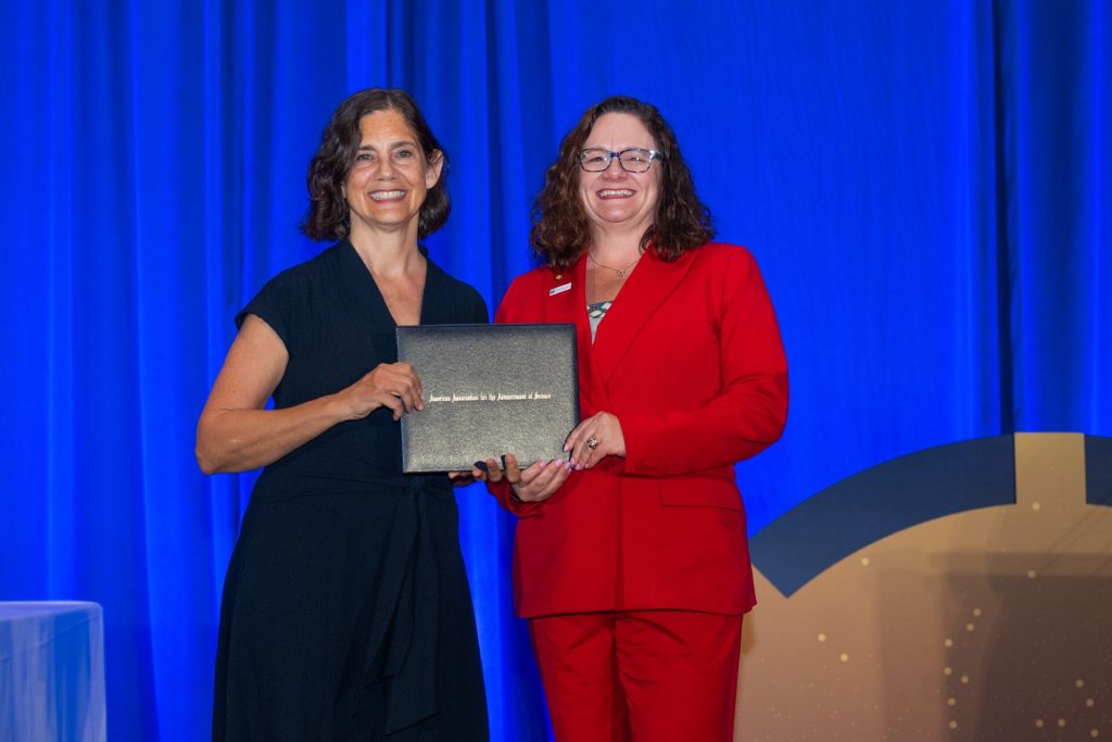 Image of Debbie Altenburg being inducted into AAAS Fellowship.