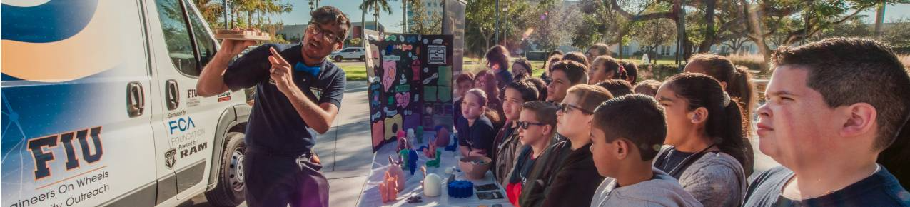 FIU student presenting to community members