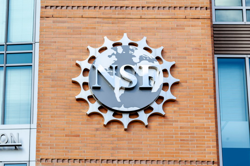 A photo of the National Science Foundation logo on their building.