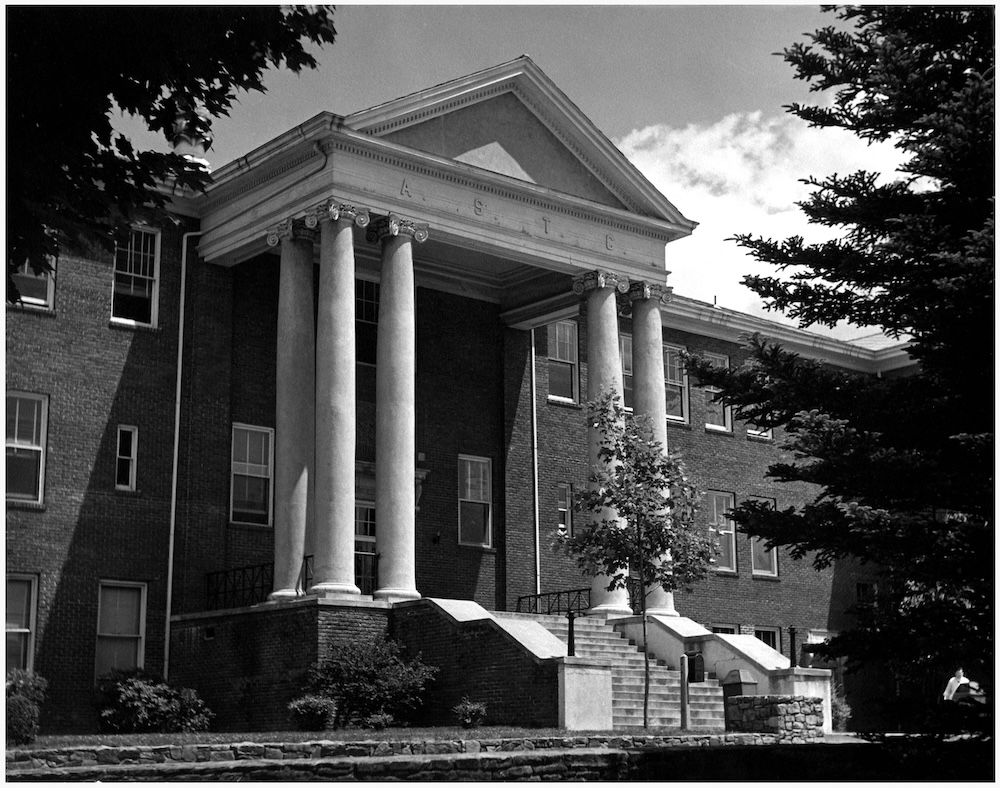 A black and white photo of a campus building at App State University.